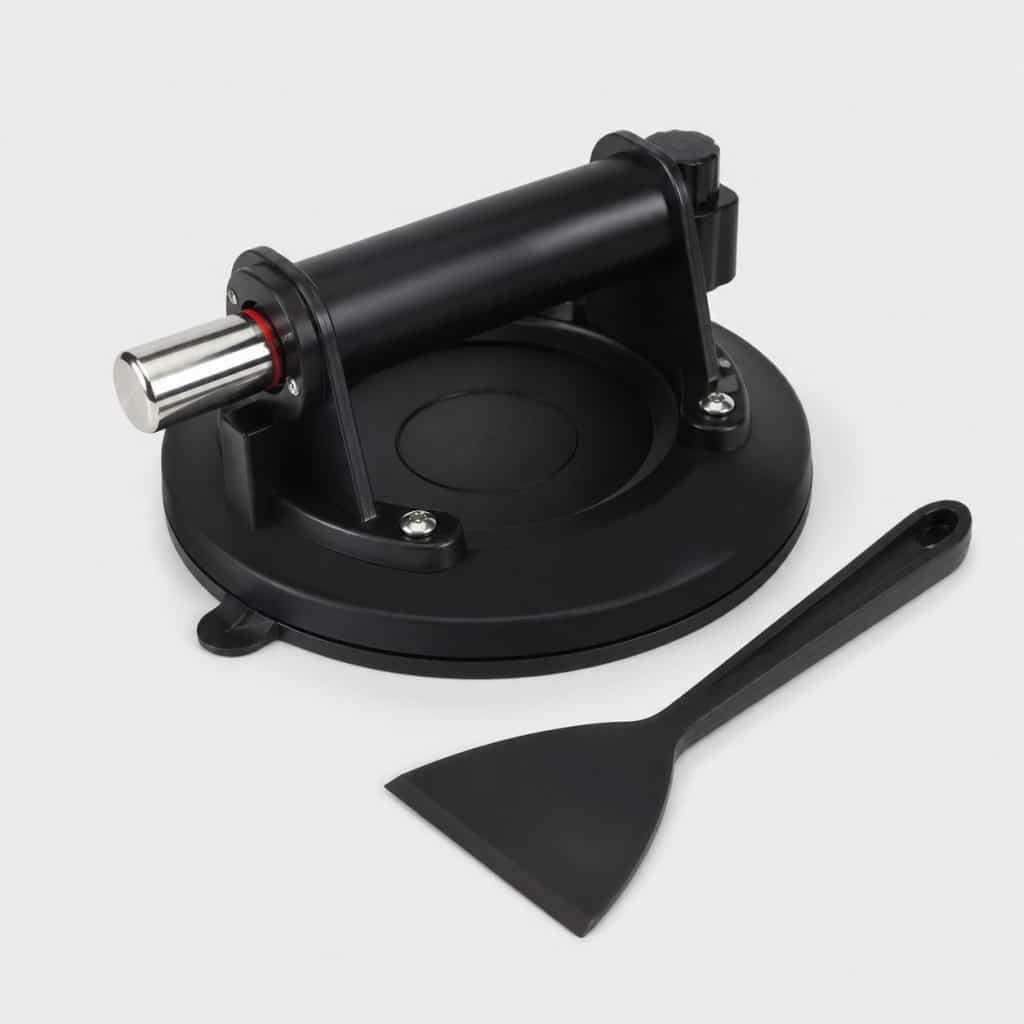 Ventouse et outils de pose pour réparation de pare-brise
